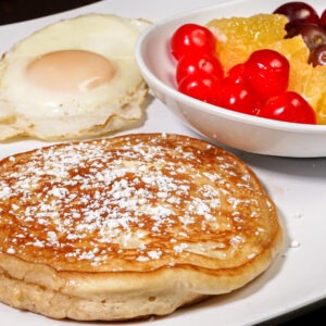 Cali Aji Latin Kitchen & Bakery Breakfast Kids Pancakes with eggs and Fruits