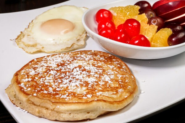 Cali Aji Latin Kitchen & Bakery Breakfast Kids Pancakes with eggs and Fruits